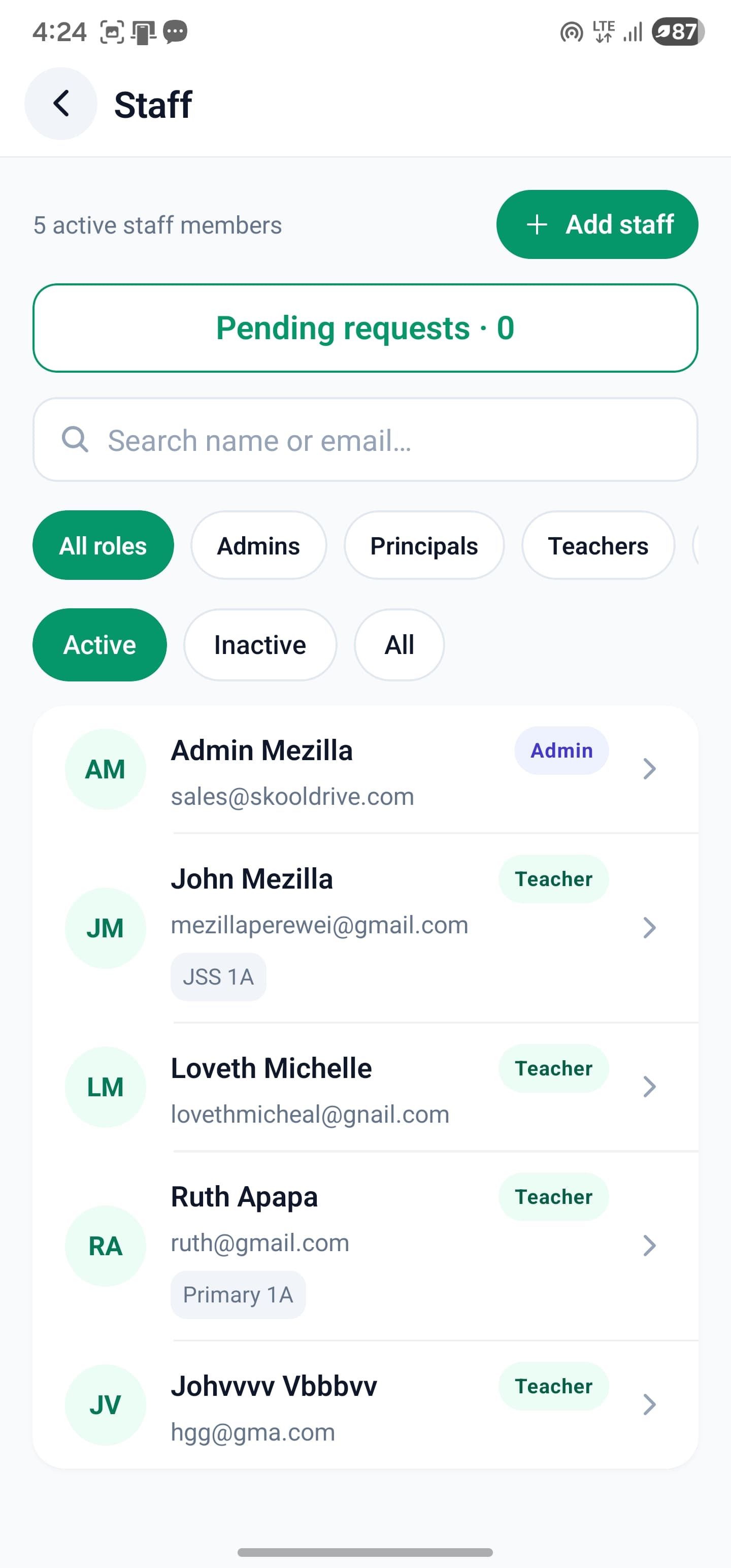 SkoolDrive staff management screen with staff registration requests, role filters and teacher assignments